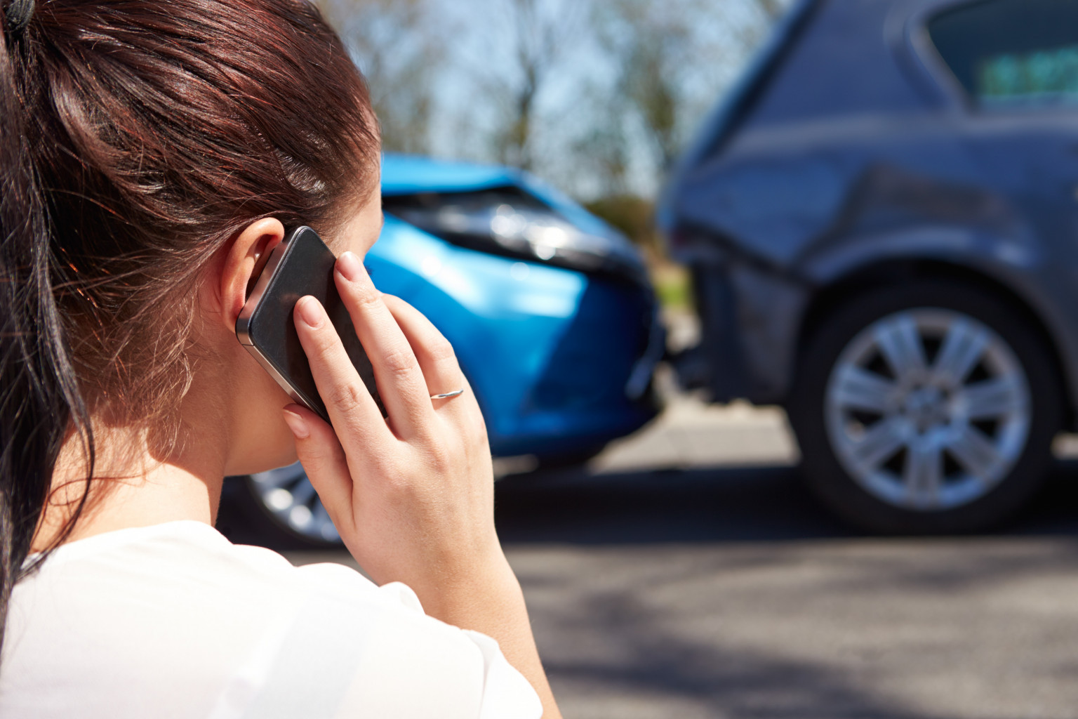 woman on phone after accident